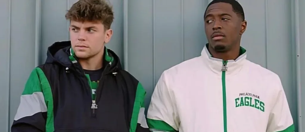 Cooper DeJean and quinyon Mitchell of the Eagles Defense in throwback starter jackets